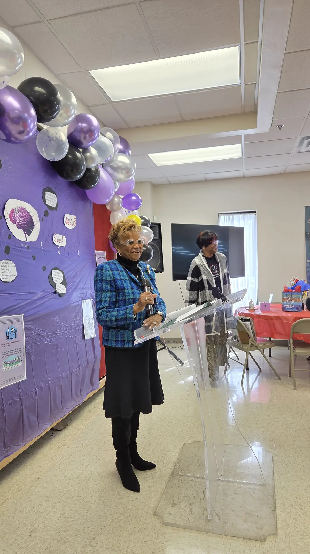 Speakers at a Renewal Center community event